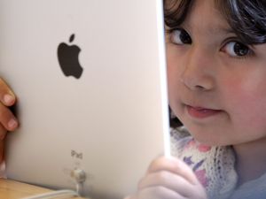 'These children lead sedentary lives with their gadgets' in UAE, says a doctor while texting on her phone. 