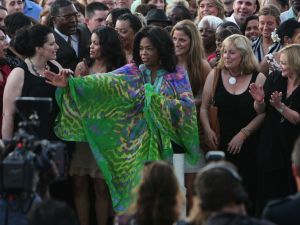 Oprah, fan of the people, loves the spotlight and what better prime seat than the stage of the Arab Awakening at Tahrir Square.