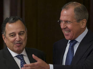 Foreign Minister Sergei Lavrov met with his Egyptian counterpart Nabil Fahmy in Cairo yesterday. The pair were accompanied by their respective Defense ministers, Sergei Shoigu and Abdel Fattah el-Sisi (AP)