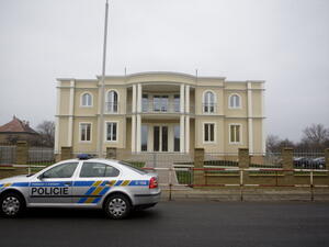 A police car passes the Palestine embassy which stands next to the residence of the late Palestinian ambassador Jamal al-Jamal on January 2, 2014 in Prague, Czech Republic.  [Getty Images]