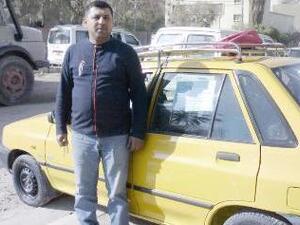 سائق تاكسي في غداد