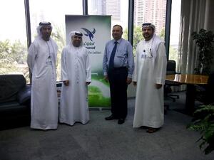 Abdulrahman Al Ali welcoming the National Air Cargo team in his office with Salem Bin Suloom
