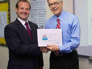 Aaron Fright, SMART’s Area Manager and Dr. Gunther Brandt, Director of the Universal American School of Dubai