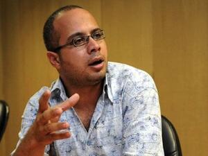A key figure in the uprising against Hosni Mubarak in 2011, political activist Ahmad Maher turned himself into the Egyptian authorities late on Saturday after they issued a warrant for his arrest. (file