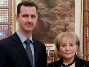 Bashar Al-Assad pictured with a somber Barbara Walters. (Image courtesy of "mail.com")