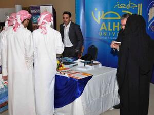 ALHOSN University's booth at Al Gharbia Universities and Colleges Fair