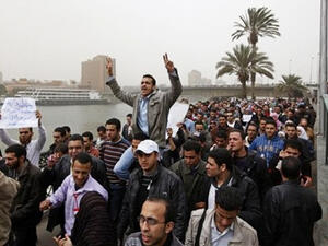 Jobless youth in Cairo protest as unemployment rates increase across the region (Hussein Malla/AP)
