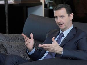 Syria's Information Minister said this week that the "Syrian street" wants Assad to run for president in this year's upcoming elections (File Archive/AFP)