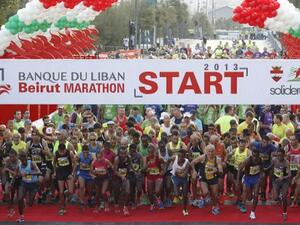 Participants start the 5km run during the 2013 Beirut Marathon on November 10, 2013 (AFP)

