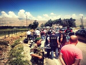 An image of the chaos in the aftermath of the roadside bomb. Image courtesy of naharnet.com