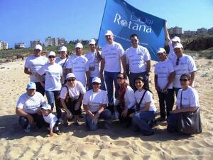 Rotana Team help clean the Jiye shoreline as part of the campaign