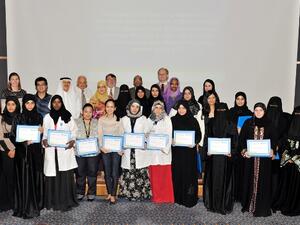 Dr. Ajayeb and Dr. Eiman flanked by ASCP Graduates during HMC ceremony
