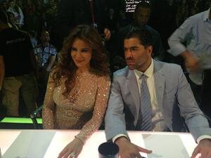 Carole and Wael get down to business.