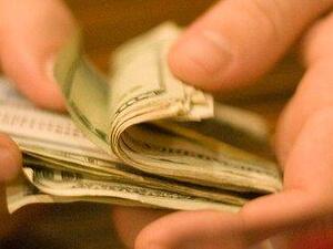 Counting cash.
