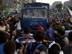 Pro-Morsi supporters in Alexandria were hit with tear gas during a protest on Monday. (AFP)