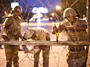 The nighttime curfew that applies across 14 of Egypt's governorates may be extended beyond mid-November. (AFP/File)