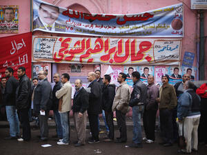 Egyptians voters waiting in line outside a polling station. 