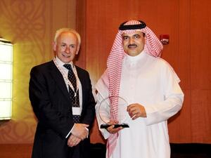 STC Group CEO Eng. Saud Al Daweesh receiving the award