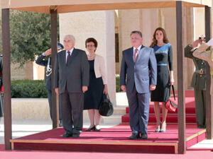 Their Majesties King Abdullah and Queen Rania receive Cypriot President Demetris Christofias and his spouse in an official ceremony upon their arrival in Amman on Wednesday (Photo by Yousef Allan).