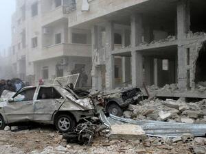 The scene following a suicide car bombing in Salmiyeh, a town in the central Syrian province of Hama, on January 22, 2013 (SANA/AFP, Ho)
