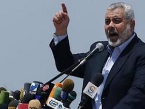 Hamas Prime Minister Ismail Haniyeh called on media officials to stop their "baseless" claims against Hamas in his speech Saturday (Associated Press)