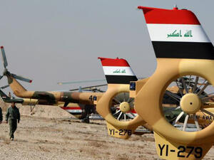 Four members of the Egyptian security forces were killed on Wednesday after the helicopter they were flying in was shot down by insurgents during a military training exercise north of Baghdad. (AFP/File)
