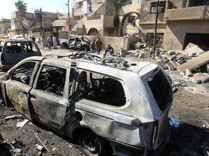 Carnage after a car bomb in Iraq.