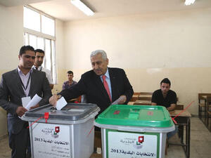 Jordanian Prime Minster Abdullah Ensour casts his vote in Amman on Tuesday. (Image via Jordan News Agency, Petra)