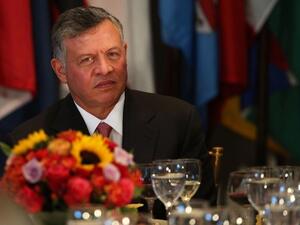 King Abdullah II of Jordan attends a luncheon at the UN in New York. He called for international help on the Syrian crisis, and warned that Jordan cannot continue to support the Syrian refugees alone. (AFP)