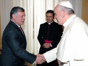 Pope Francis welcomes Jordan's King Abdullah prior a private audience on August 29, 2013 at the Vatican. (AFP)