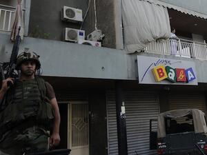 A Lebanese army soldier monitors as they perform search operations in the Abra district of the southern Lebanese city of Sidon on Monday. (AFP)
