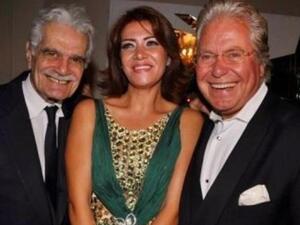 Hussein and ex-wife Liqa pose with legendary actor, Omar Sharif