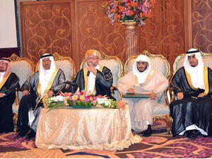 Mohammed Abdu sits alongside Sheikhs at the wedding ceremony of his daughter Reem. (Image: Facebook)