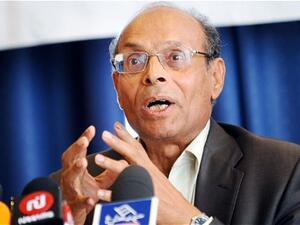 Tunisia's president Moncef Marzouki told reporters in Paris that his country "will get through this difficult phase. We are determined to promote a democratic process, whatever the present difficulties may be" (Courtesy of the Telegraph)