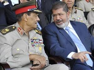 Mohamed Morsi, right, with head of the army Mohamed Tantawi.