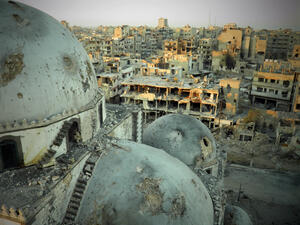 A handout image allegedly shows the Khaled bin Walid mosque, whose mausoleum has been partially destroyed in the al-Khalidiyah neighborhood of the central Syrian city of Homs. (AFP/HO/SHAAM NEWS NETWORK)