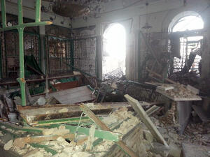 A handout image released by the Syrian opposition's Shaam News Network on July 22, 2013, allegedly shows the partially destroyed mausoleum of the Khaled bin Walid mosque (AFP/HO/SHAAM NEWS NETWORK)