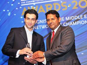 Nader Baghdadi, Regional Sales Manager of Motorola, receiving the award
