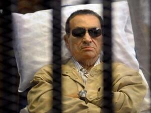 Former Egyptian President Hosni Mubarak sits inside a dock at the police academy, on the outskirts of Cairo June 8, 2013. (AFP)