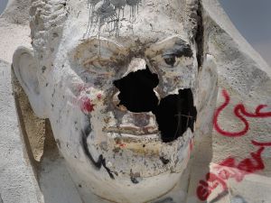 Destroyed statue of Mubarak.