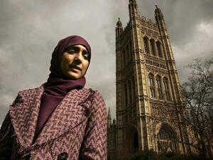 A British Muslim poses outside Westminster 