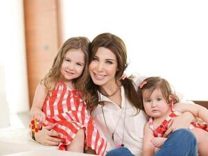 Nancy with her daughters Ella and Milla