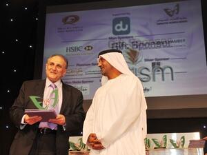 Osman Sultan, CEO of du was presented with an honorary trophy