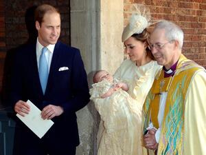 Britain's Prince William, Duke of Cambridge, and his wife Catherine, Duchess of Cambridge, leave with their son Prince George of Cambridge following his Christening by the Archbishop of Canterbury (R) at Chapel Royal at St. James's Palace. Baby George was christened using holy water from the Jordan River. (AFP)