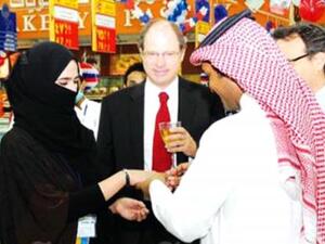 Abdulla Alanazi, exchanged rings with his fiancé at Carrefour supermarket, witnessed by other employees. (Photo courtesy Saudi Gazette)