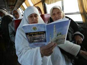 On the move: these women are on the way to Mecca for the Hajj 