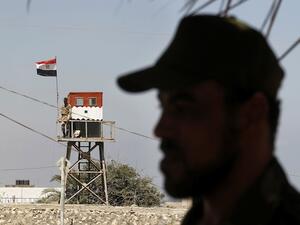 RAFAH : A Hamas policeman (R) stands in Rafah in the southern Gaza Strip on the border with Egypt, on July 5 (Source: AFP / SAID KHATIB)