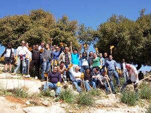 Employees of Four Seasons Hotel Amman planting trees