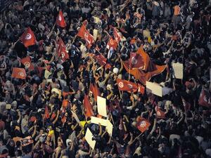 Tunisians chant slogans in front of the National Constituent Assembly on August 6, 2013 in Tunis. (AFP)