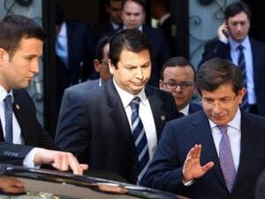 Turkish Foreign Minister, Ahmet Davutoglu leaves a briefing on Syria yesterday